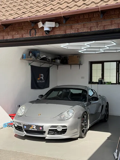 Silver Porsche Cayman in the J.R Detailing unit